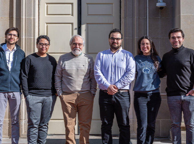 Nicolas Bueno, Hanif Yoga, Turgay Ertekin, Nijat Gasimli, Ianna Gomez and Baran Yucel standing in front of Hosler Building